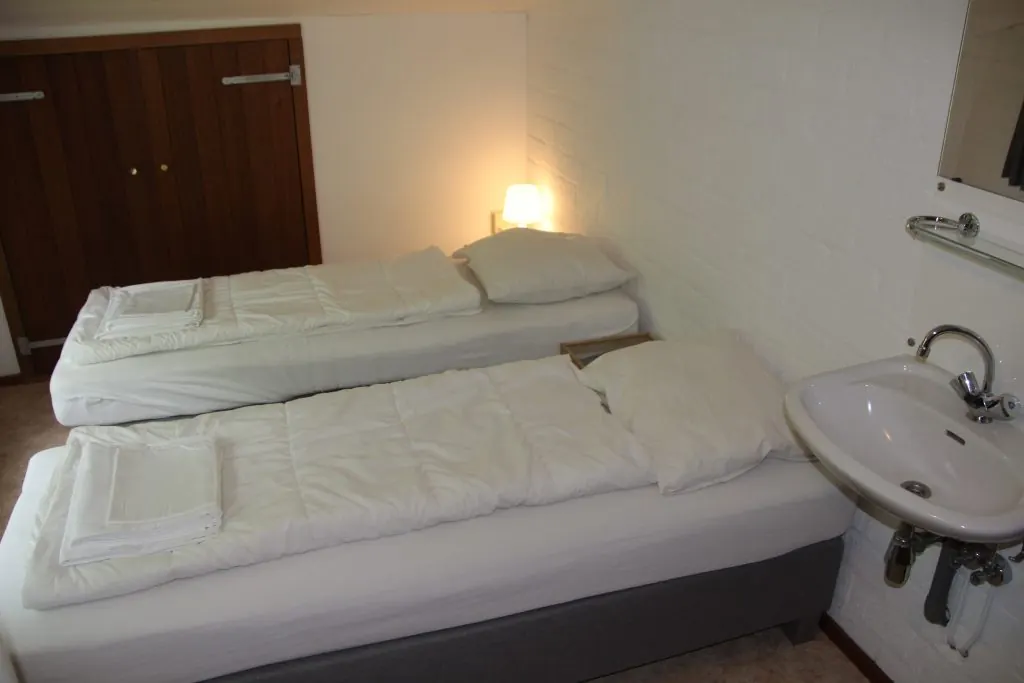 Een slaapkamer onder de kap in Waterval